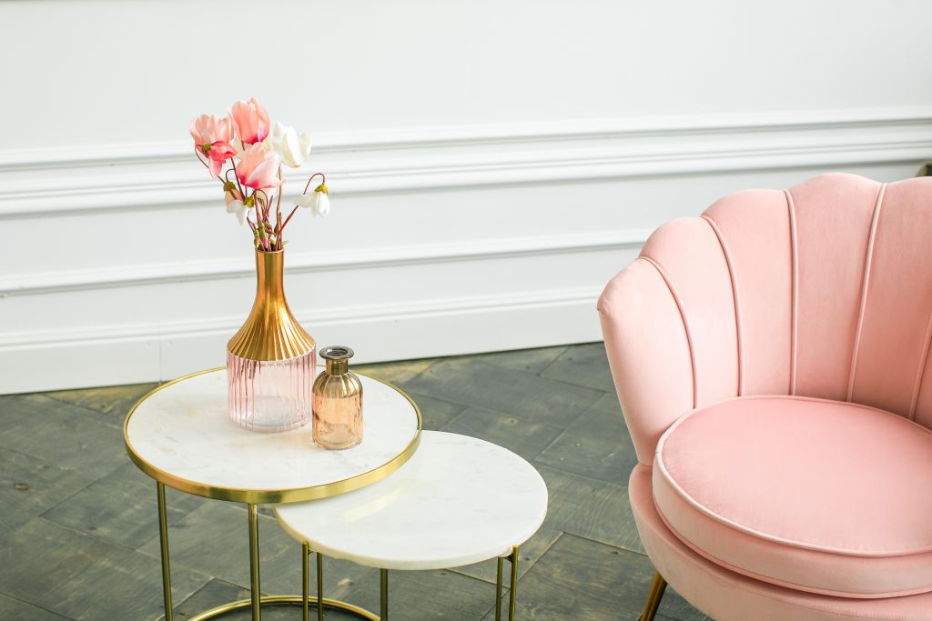 beautiful classical white interior with a sofa and a coffee table. Retro, classics. Luxury white interior